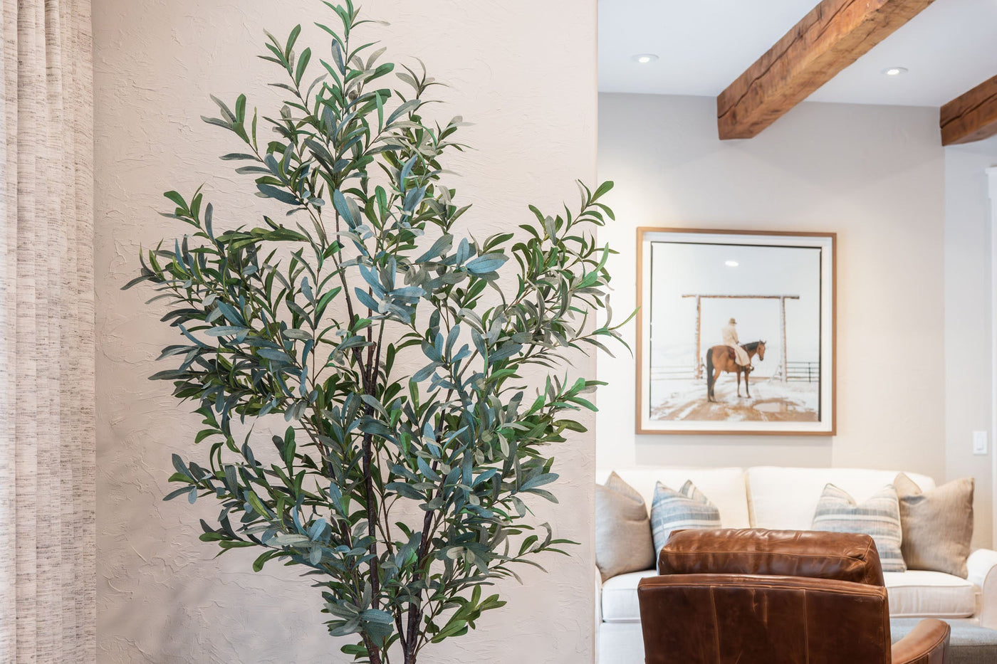 Lifelike Wholesale Artificial Olive Tree in Luxury Living Room – New Growth Designs